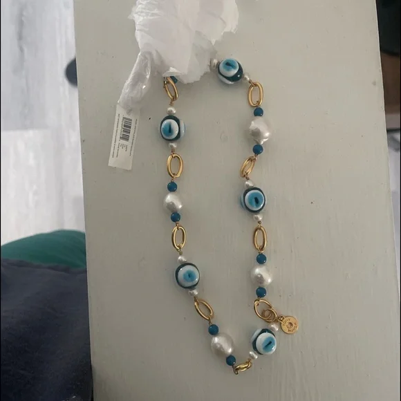Tory burch evil eye necklace hotsell